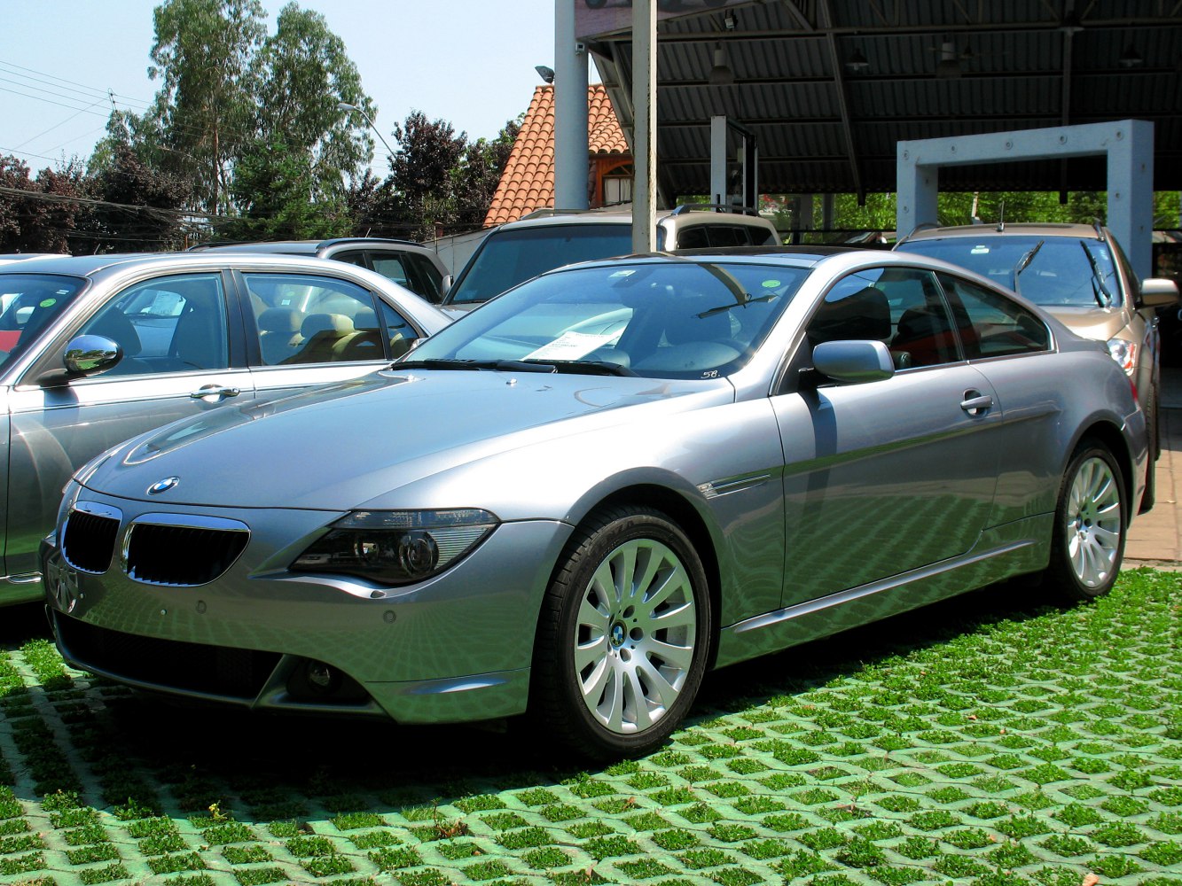 Silver coupe with kidney grilles and alloy wheels