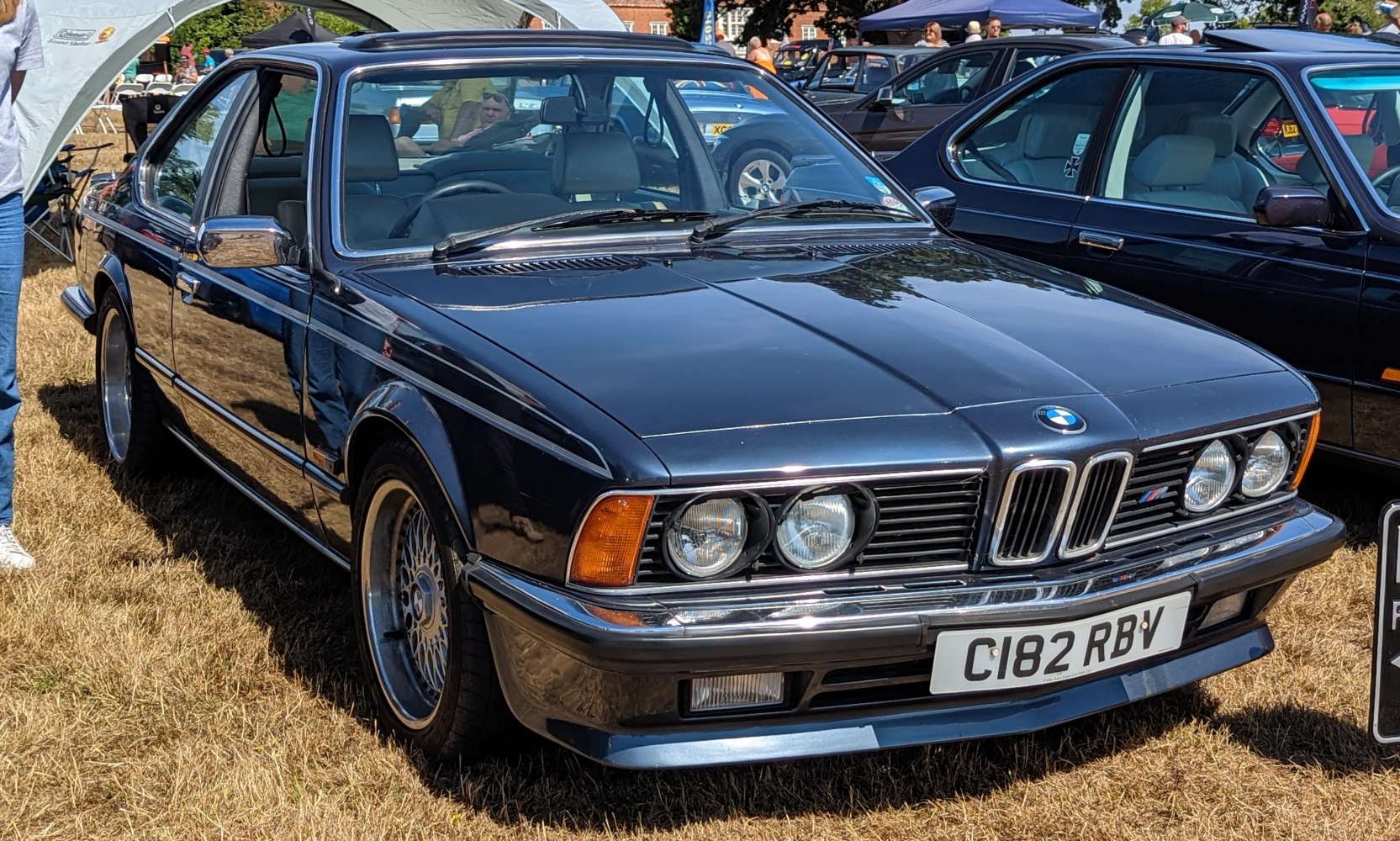 Classic coupe with quad headlights and sleek 1980s design