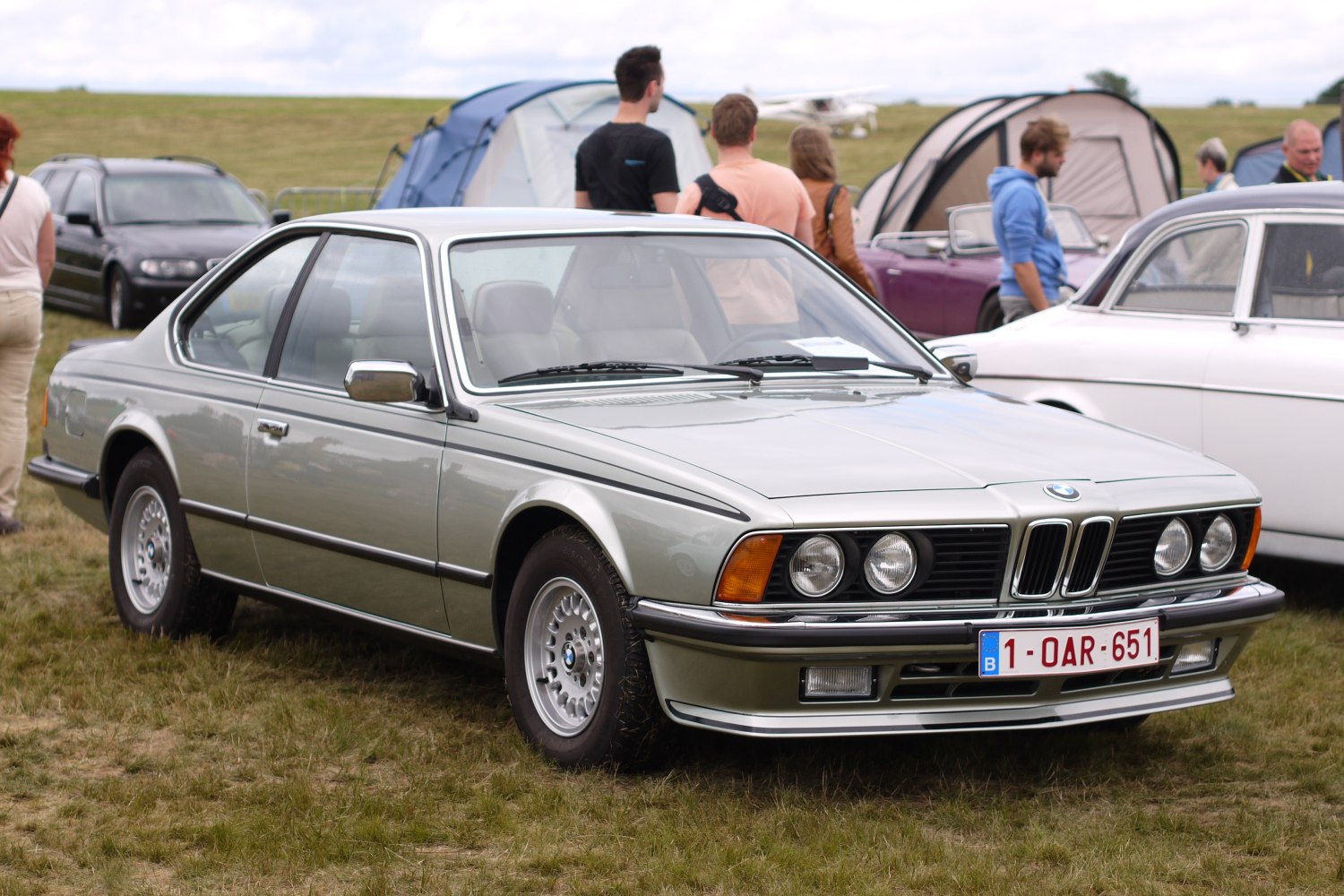 Classic coupe with quad headlights and chrome bumper