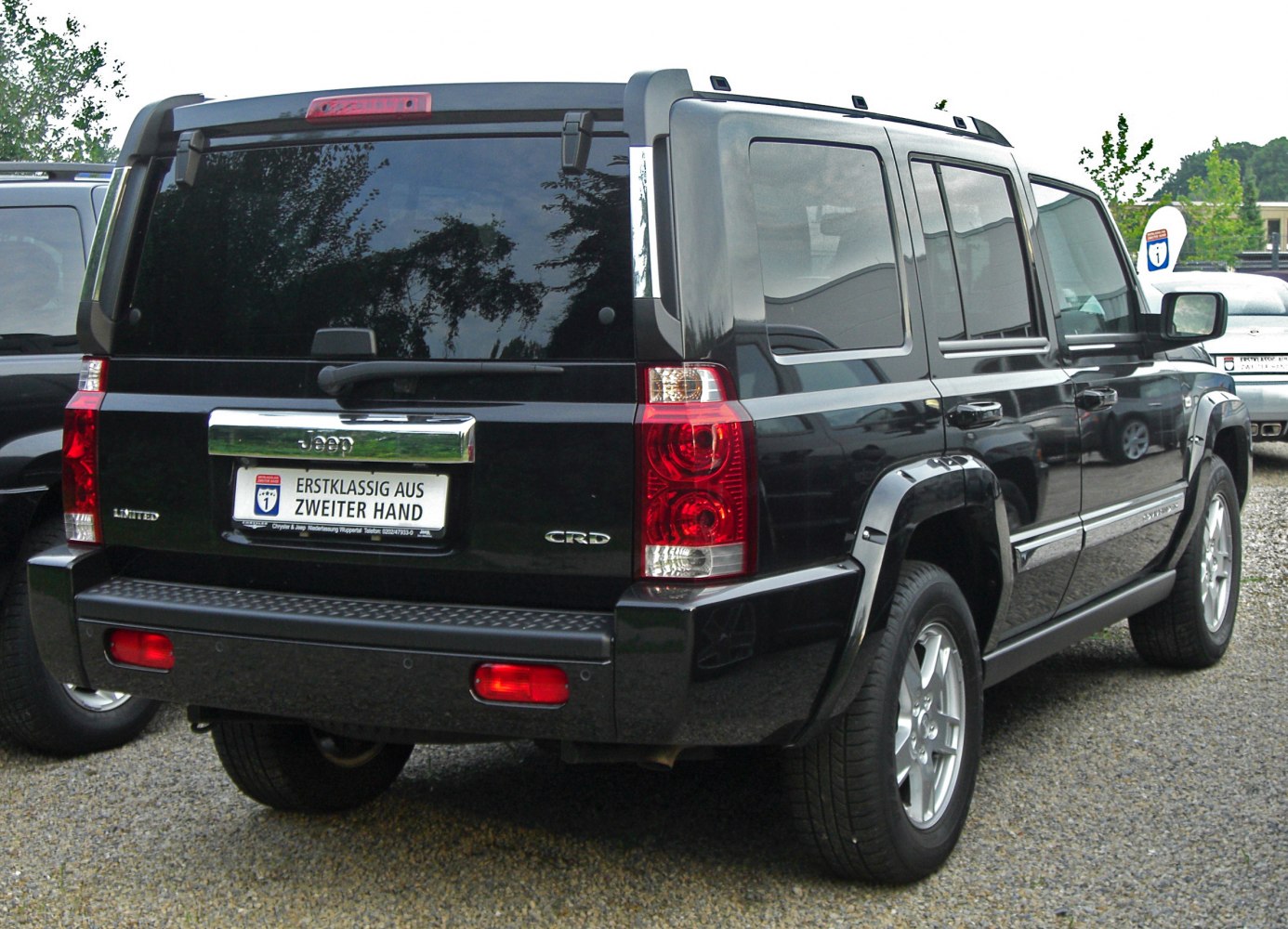 Boxy SUV rear with distinctive taillights and tinted windows