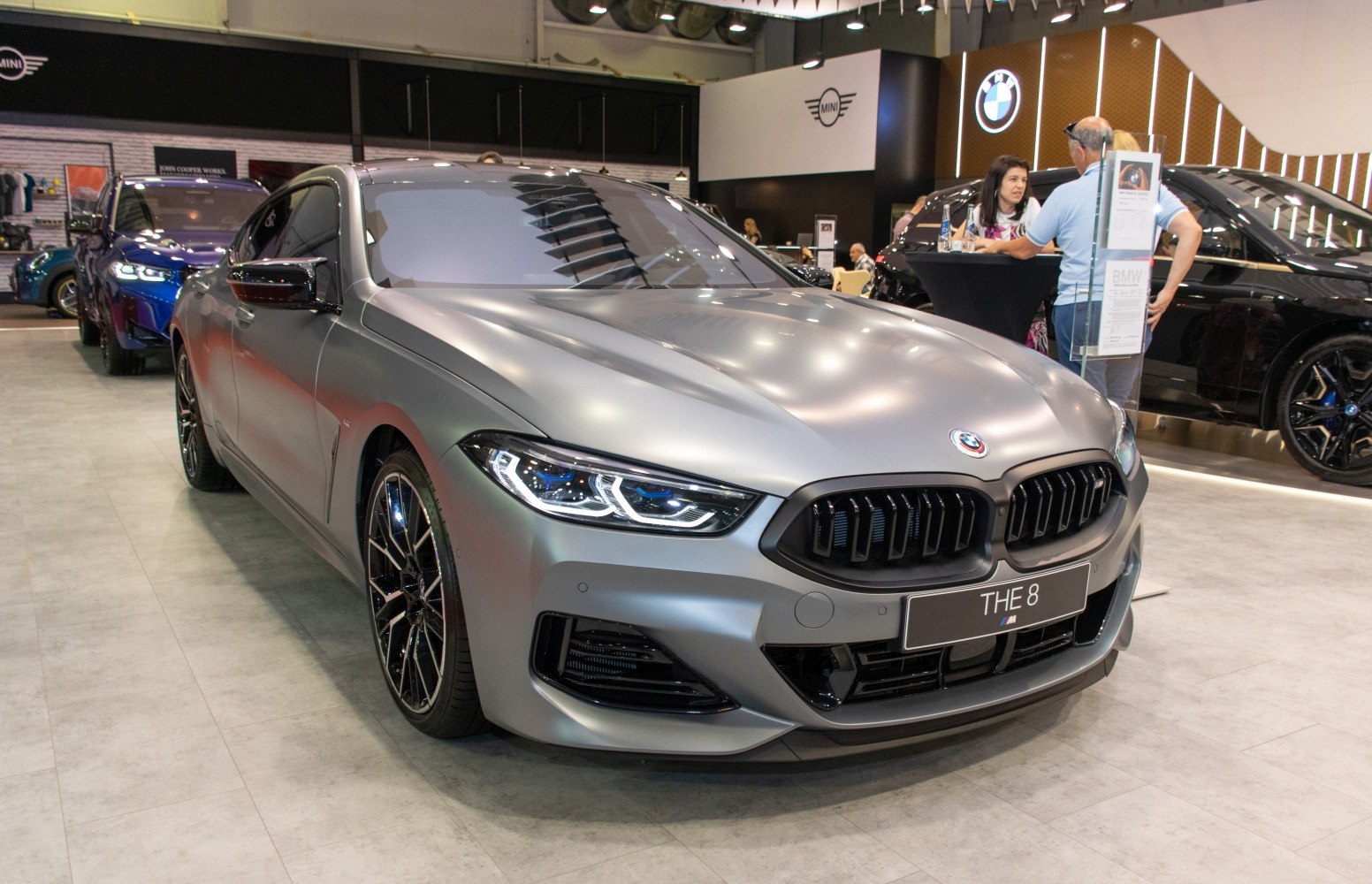 Front view and LED headlights of a luxury coupe