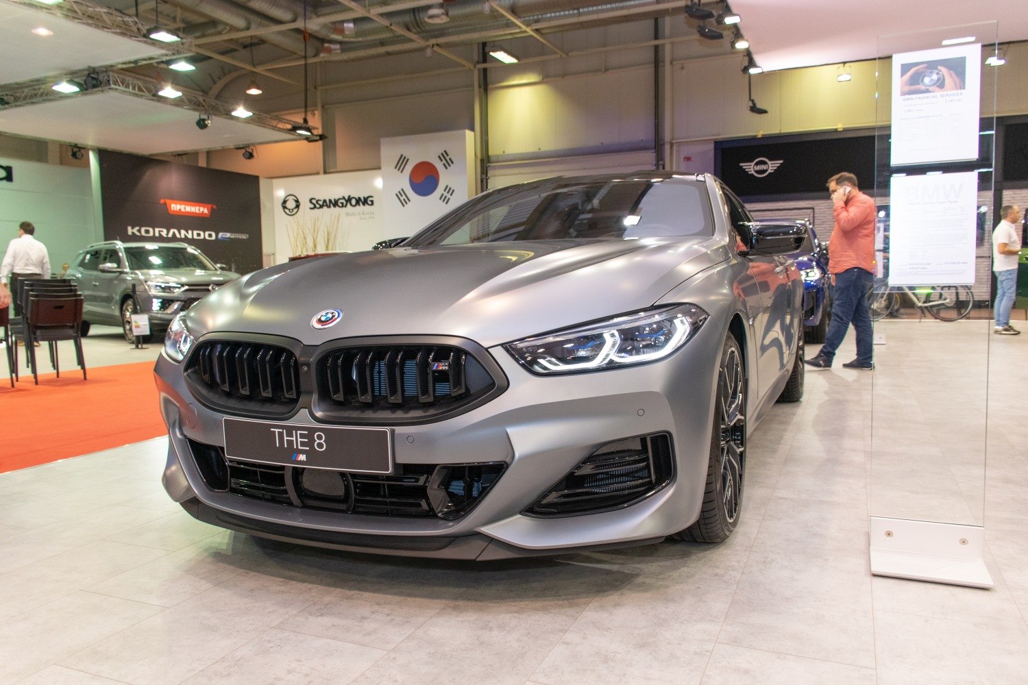 Matte-finished front view with sleek headlights and kidney grille