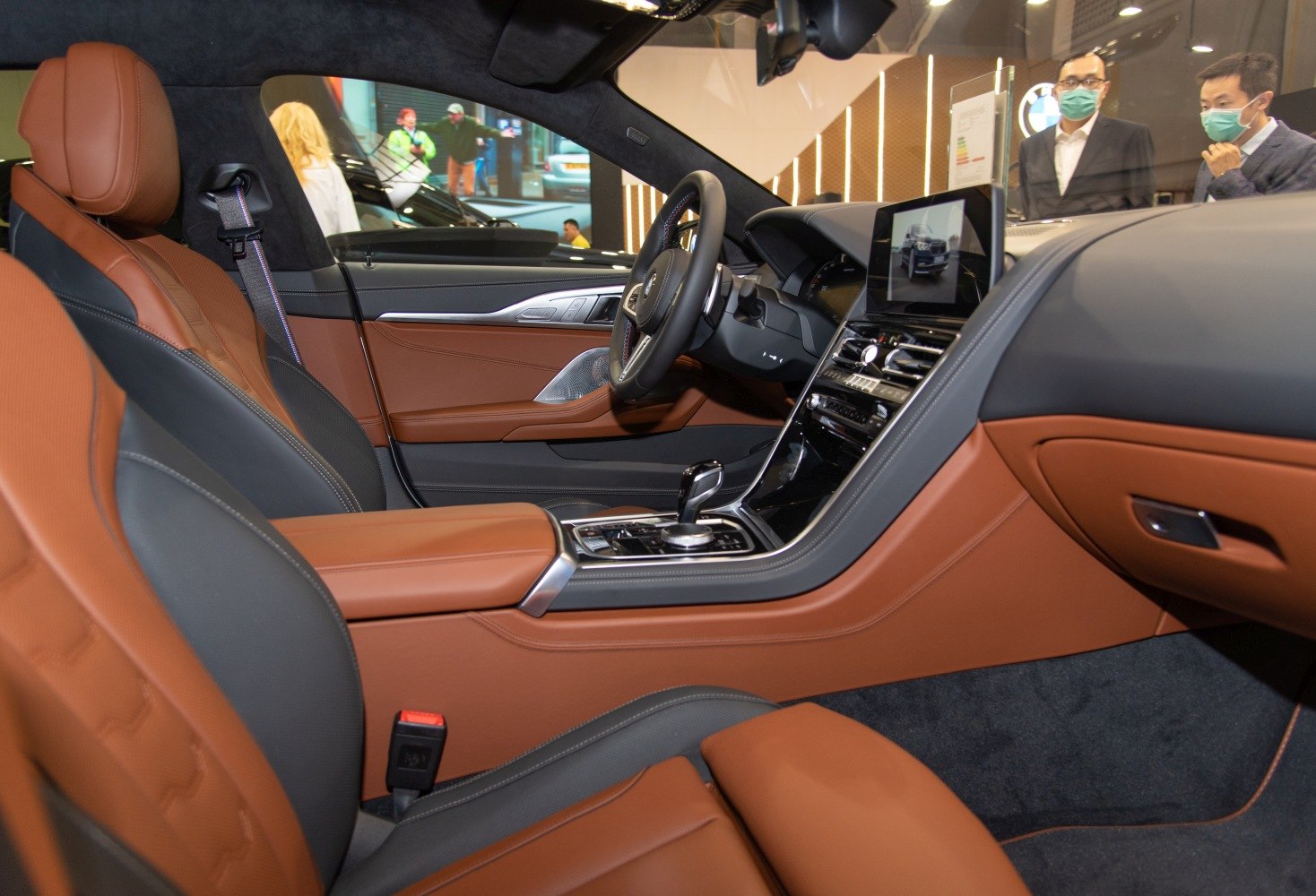 Luxury brown and black leather interior with digital dashboard and sleek center console