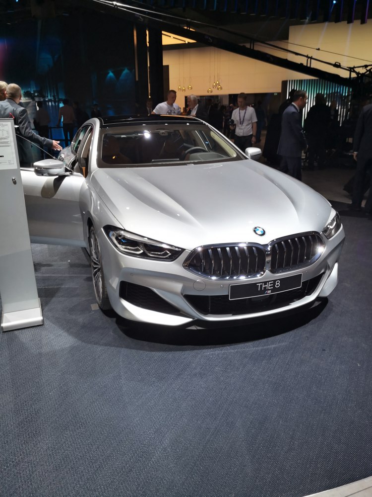 Front grille and sleek headlights of a luxury Gran Coupe.