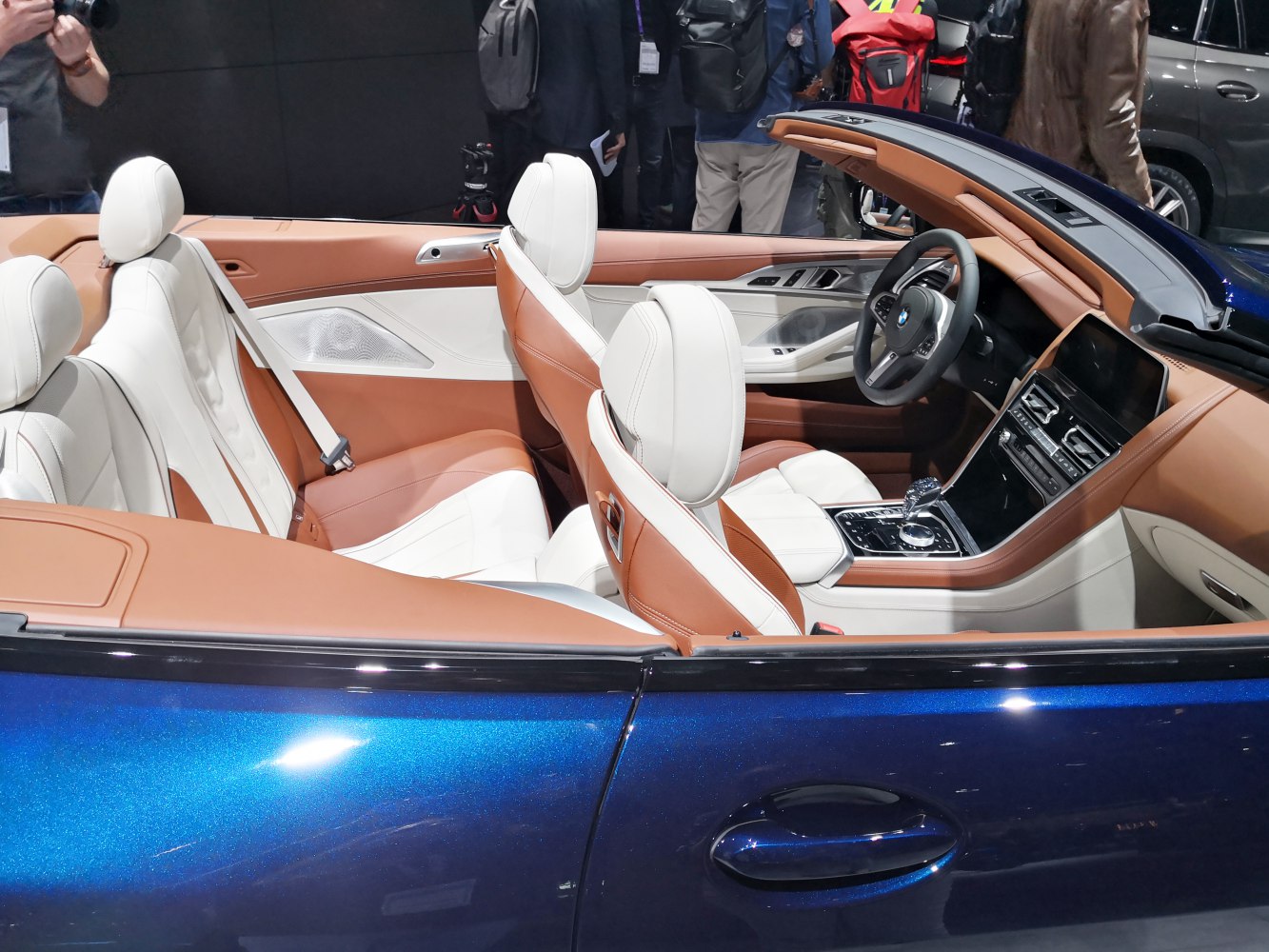 Convertible interior with two-tone leather seats and modern console
