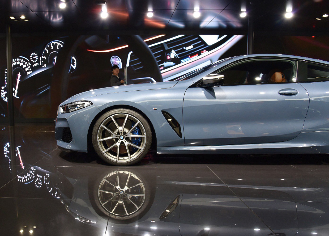 Side profile with alloy wheel and blue brake caliper