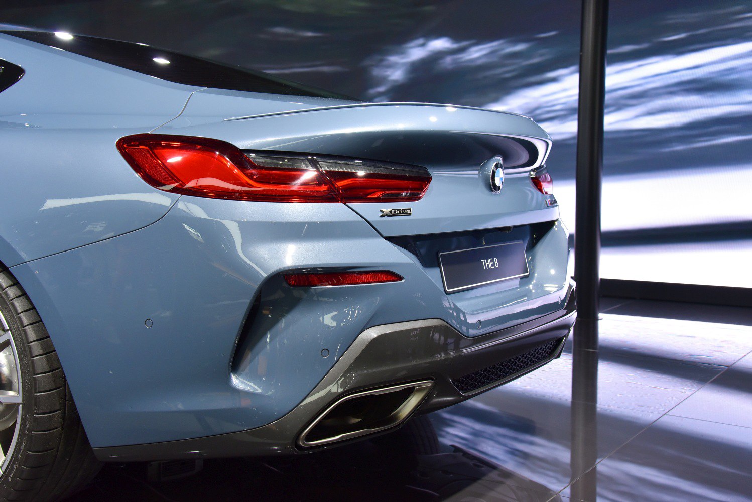 Rear tail lights and exhaust design of a luxury coupe