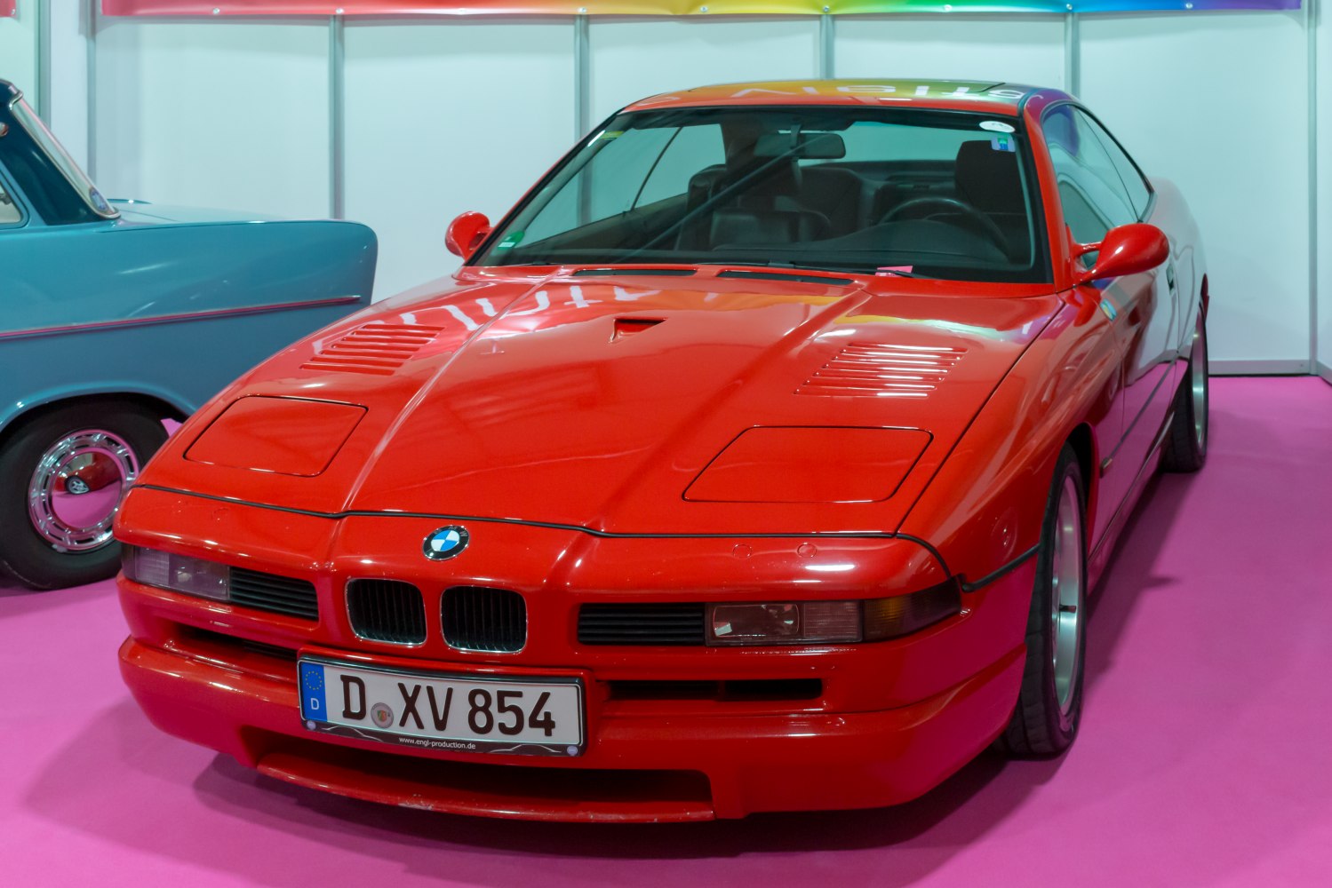 Front view with pop-up headlights and sporty hood vents