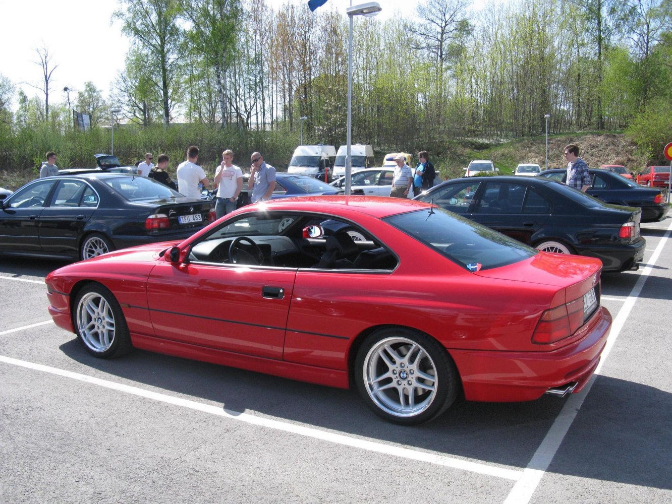 Red coupe with sleek design and alloy wheels