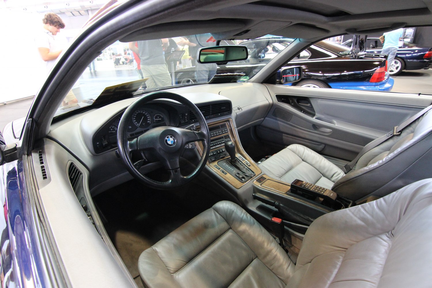 Classic BMW car interior with dashboard and leather seats