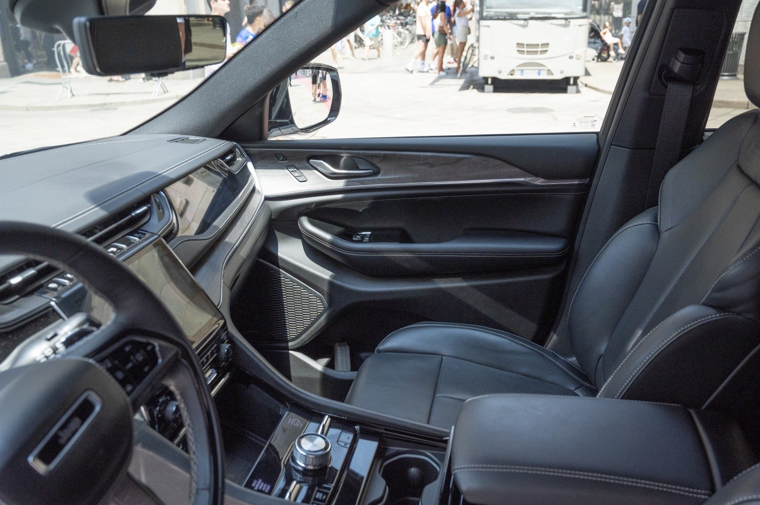 Luxury SUV interior with advanced dashboard and leather seating