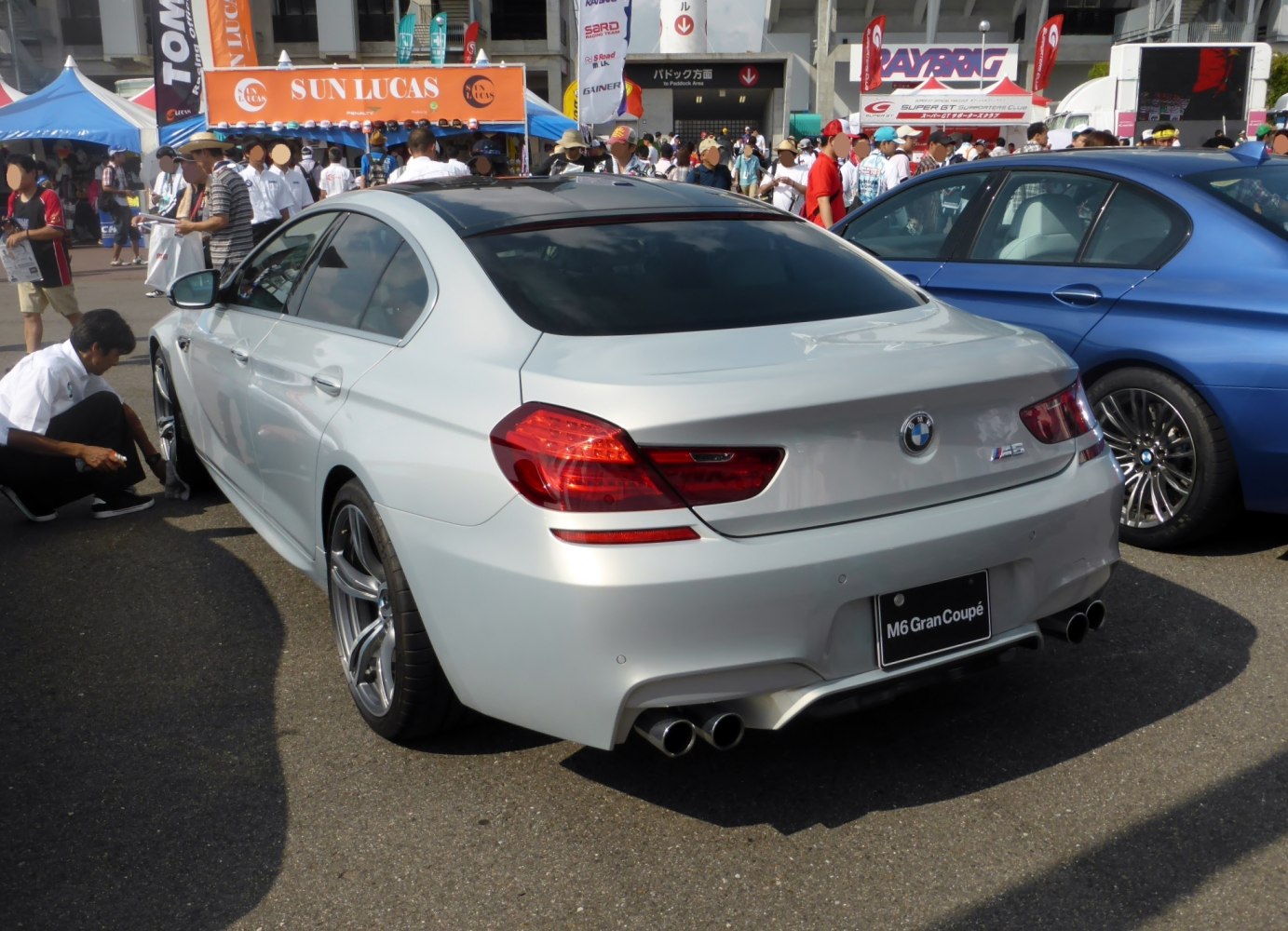 Silver BMW M6 Gran Coupe rear with quad exhausts and tinted windows