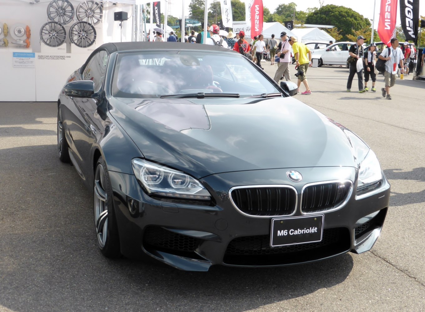 Front view of BMW M6 Convertible with soft top and LED headlights