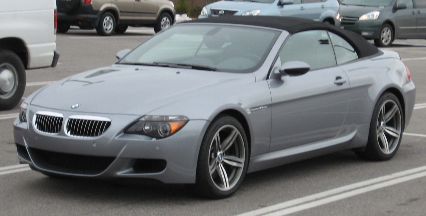 Convertible silver car with kidney grille and sporty alloy wheels