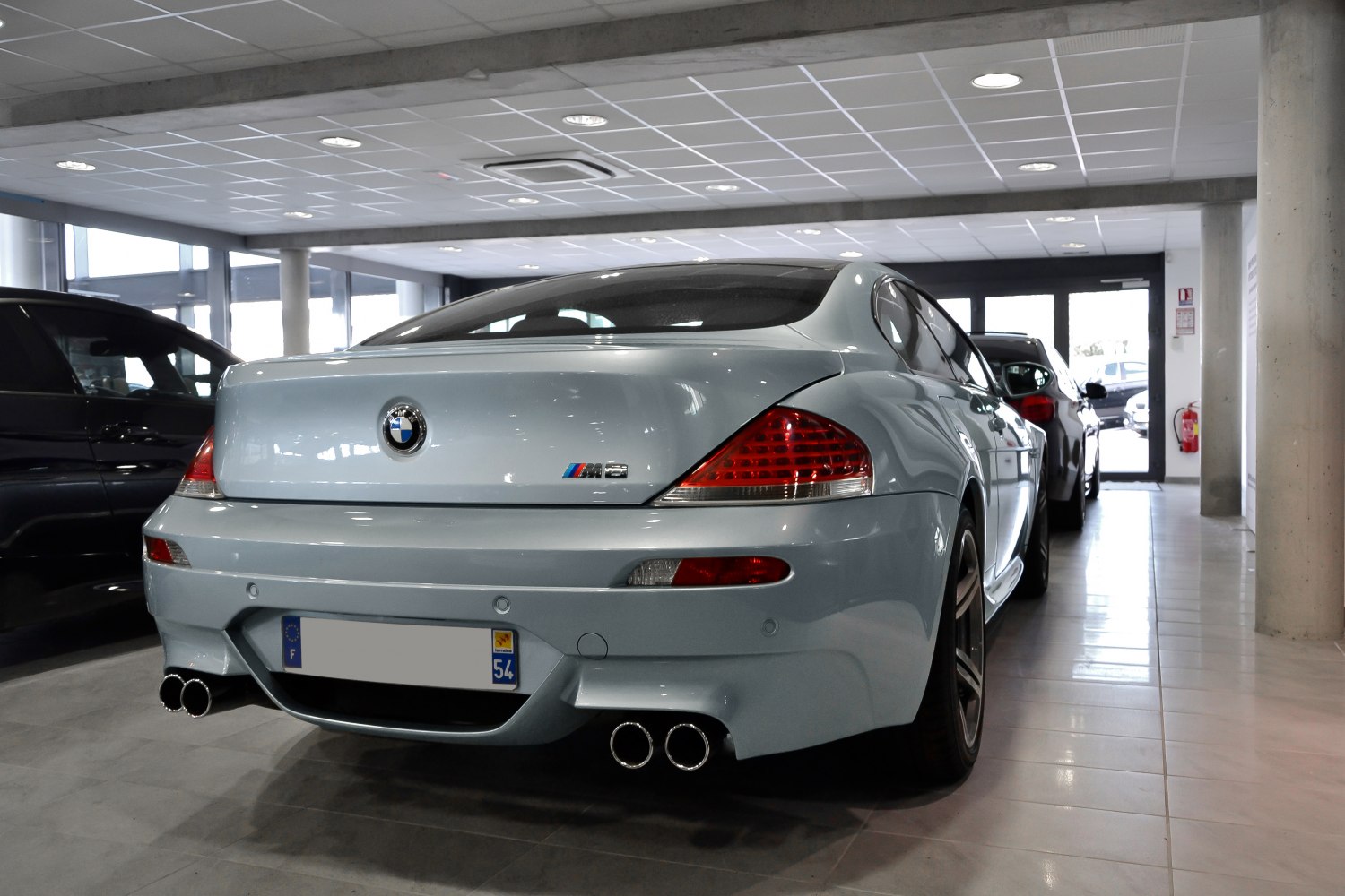 Rear view showing quad exhaust and distinct taillights