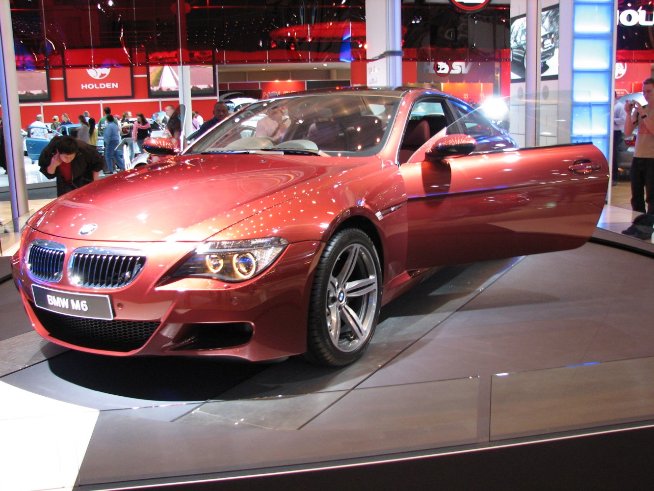 Front view with open driver door and alloy wheels