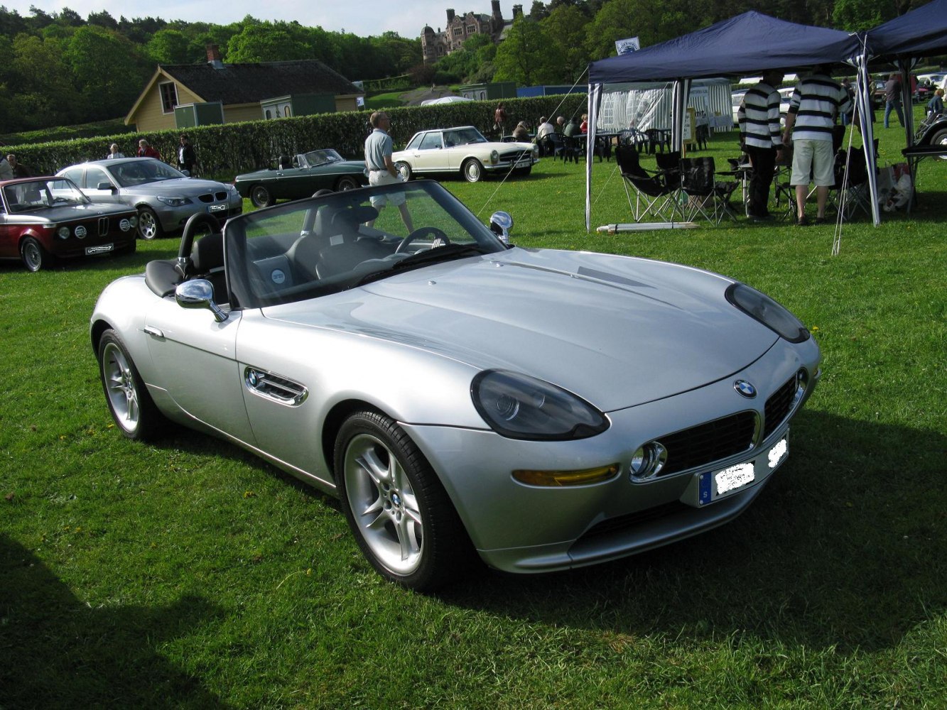 Silver convertible with sleek front design and alloy wheels