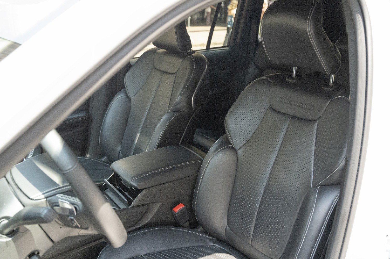 Black leather front seats with 'Overland' embossing and detailed stitching
