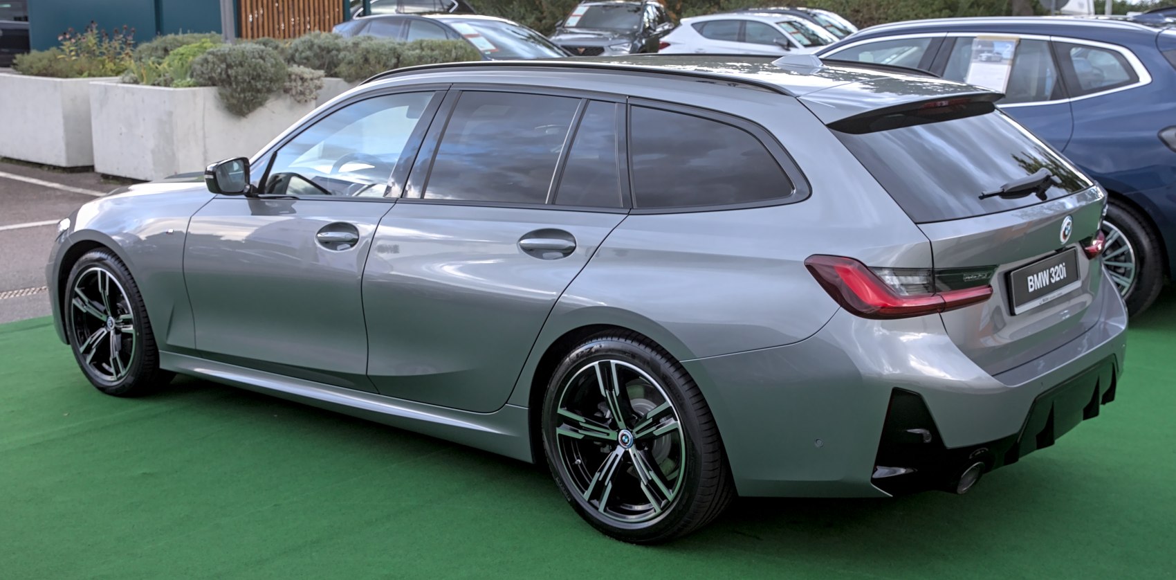 Sporty silver station wagon with alloy wheels and tinted rear windows