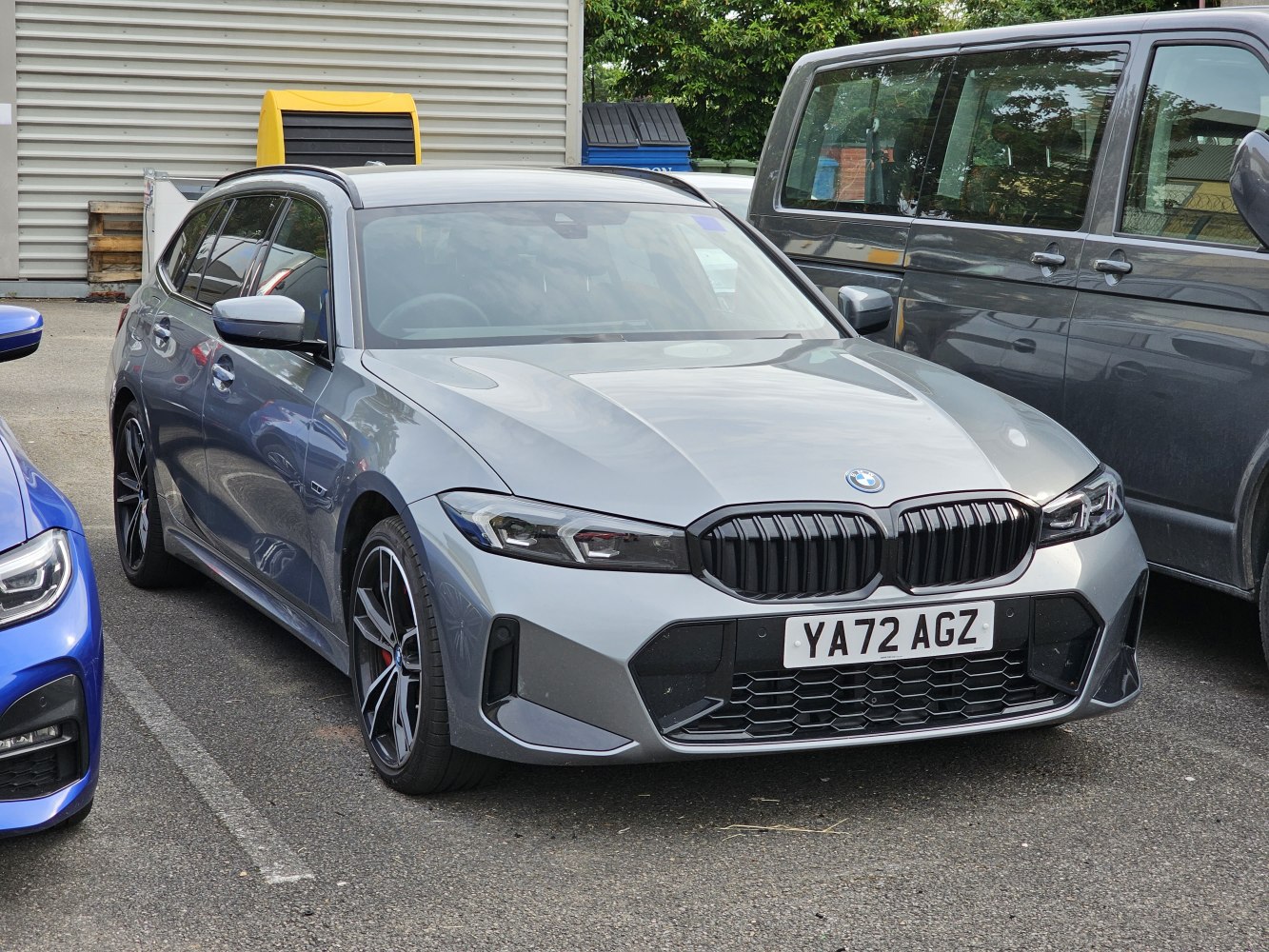 Facelifted 3 Series Touring front and side profile with sleek headlights and sporty wheels