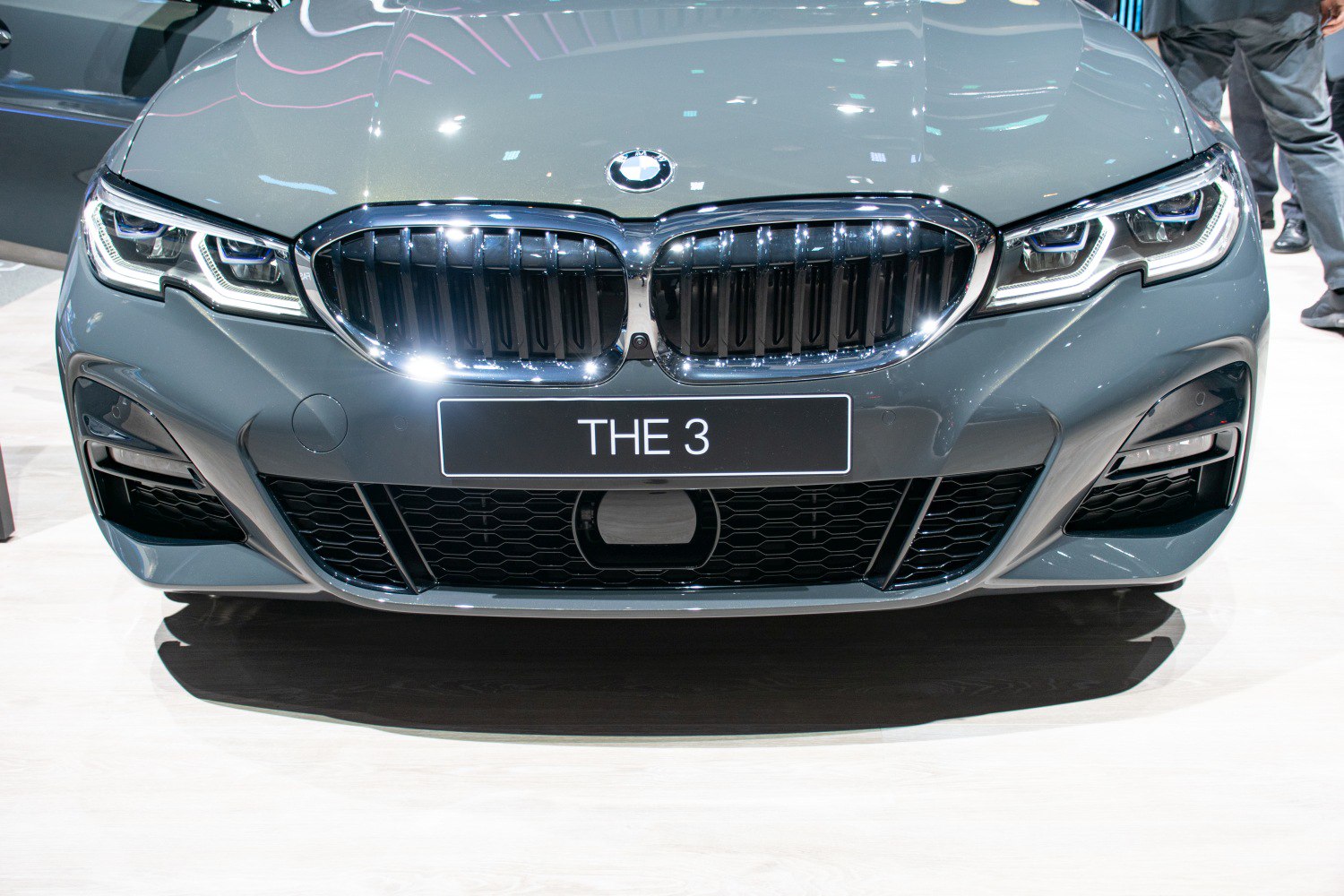 Close-up of front kidney grille and LED headlights