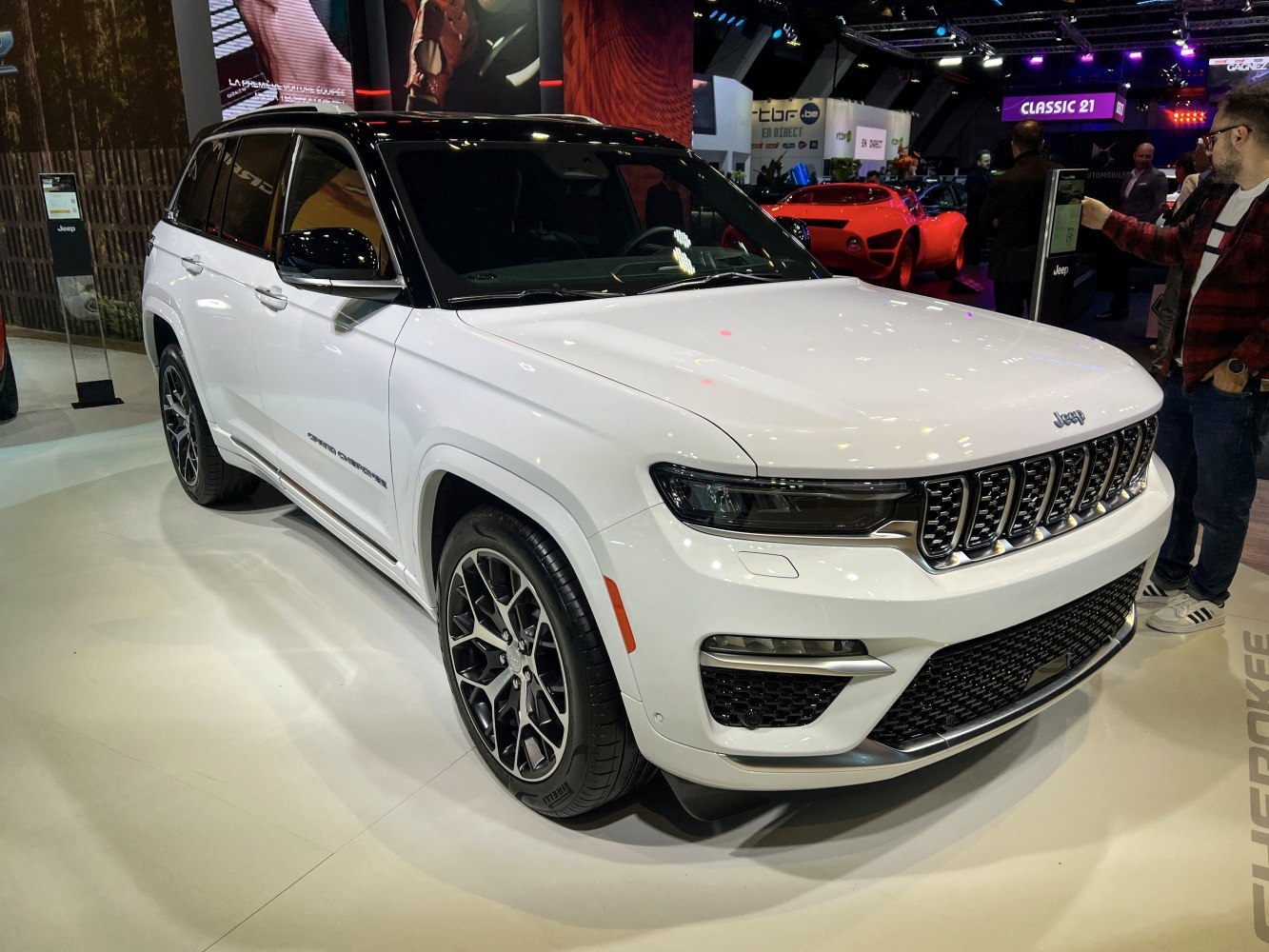 White SUV with distinct grille, LED headlights and alloy wheels
