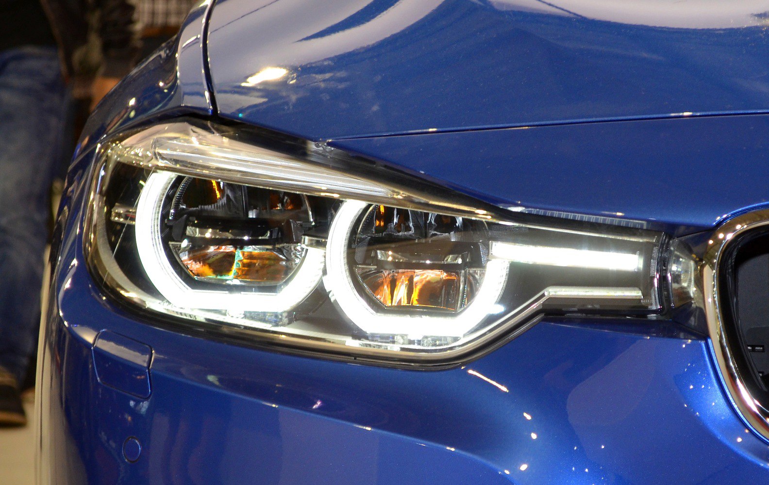 Close-up of BMW 3 Series F30 LCI facelift headlight with LED elements
