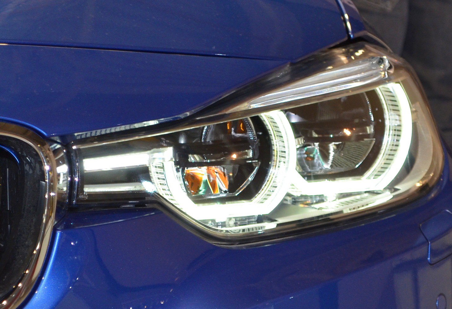 Close-up of LED headlight with distinctive ring design