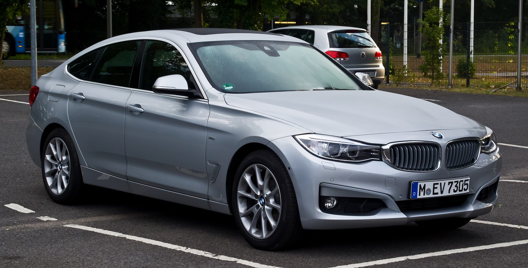 Silver hatchback with distinctive front grille and alloy wheels
