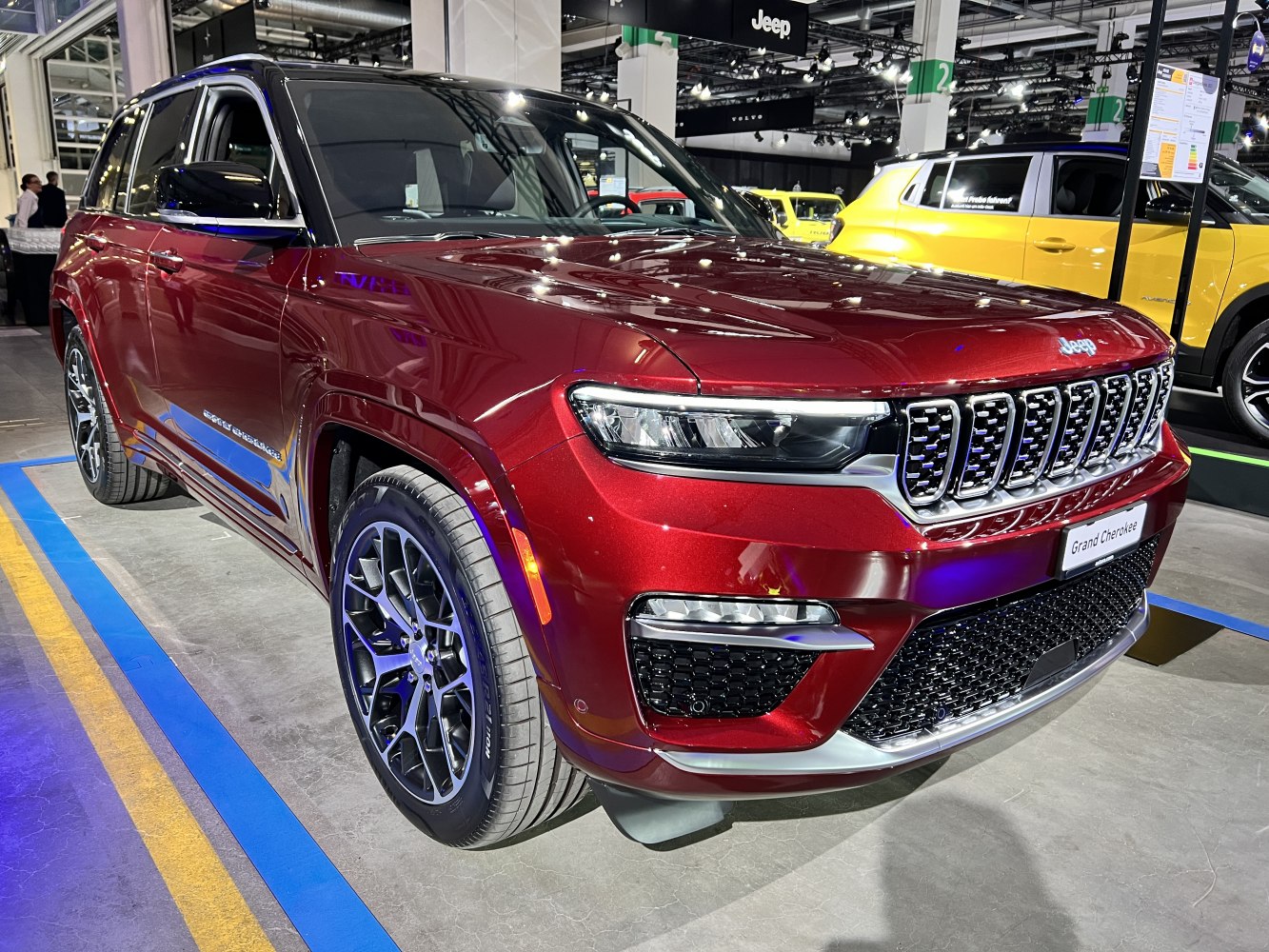 Bold front grille and sleek LED headlights with black rims.