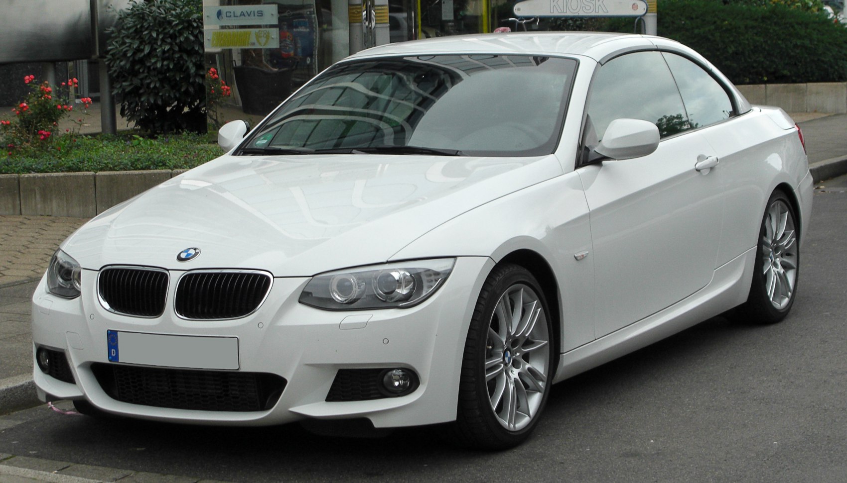 White BMW 3 Series Convertible front with headlights and kidney grille