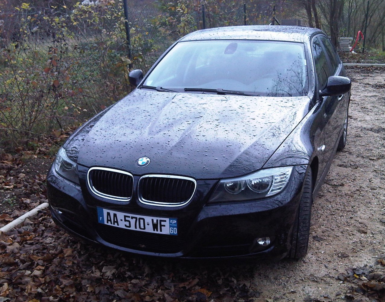 Front view of a sedan with kidney grille and detailed headlights