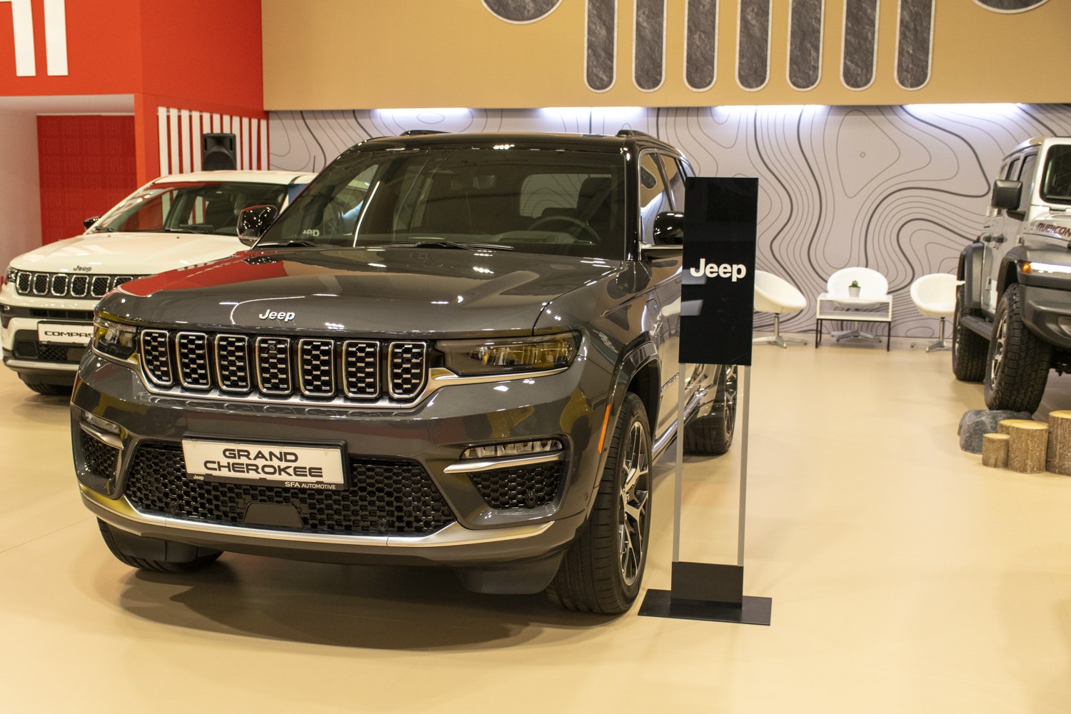 Front view with distinctive Jeep grille and headlights