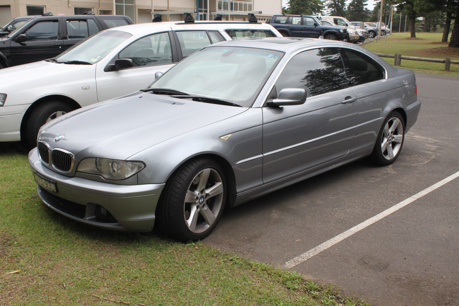 Silver BMW 3 Series E46 facelift two-door front side view