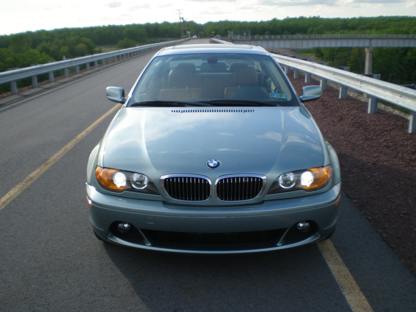 Front view of BMW E46 Coupe with headlights and kidney grille