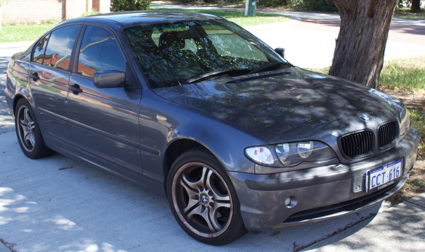Front-side view showing headlights, wheels, and body lines
