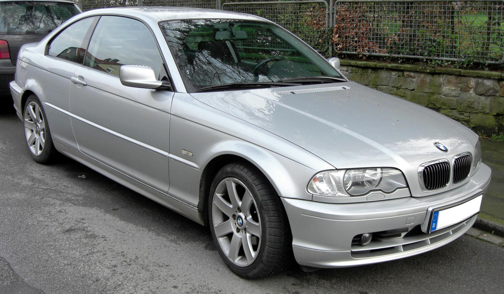 Silver coupe with kidney grille and alloy wheels