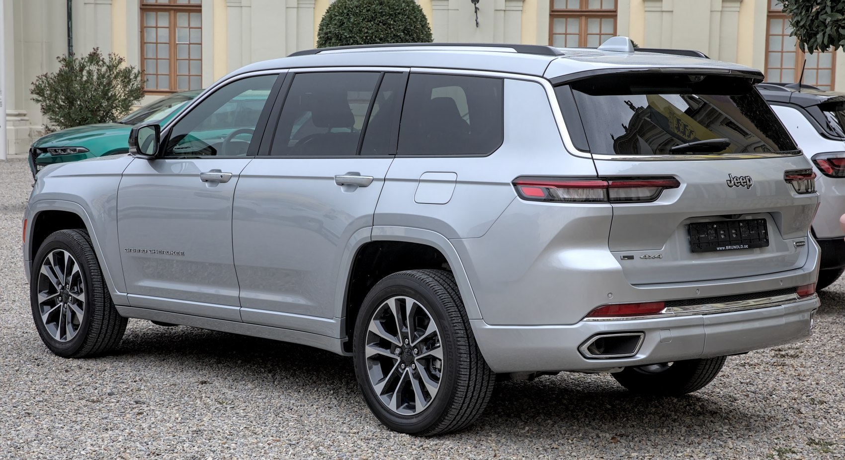 Silver SUV rear side with taillights and alloy wheels