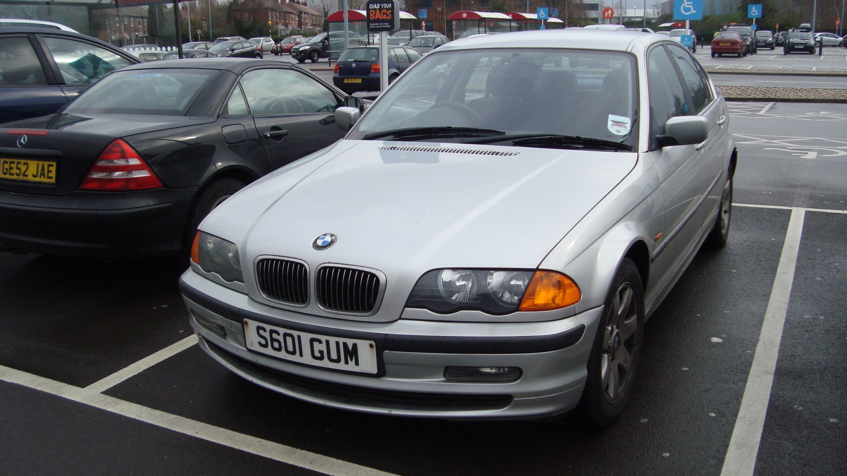 Front exterior with kidney grille and dual headlight setup
