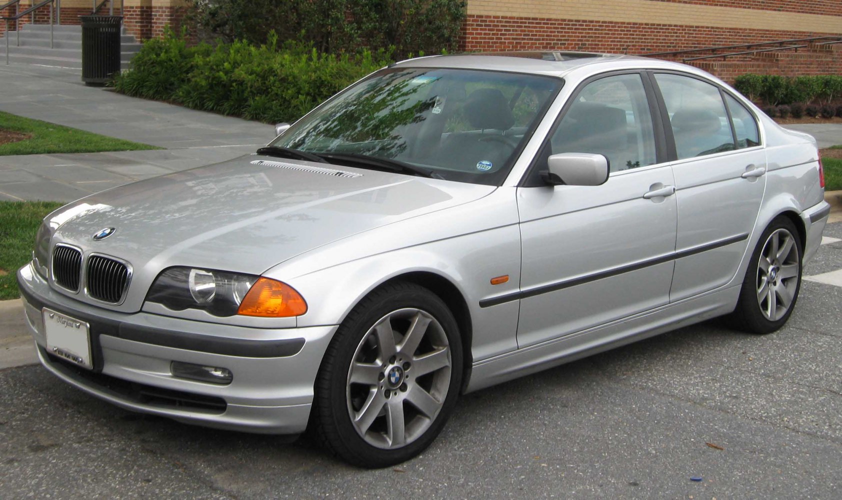 Silver sedan with distinctive headlights and alloy wheels