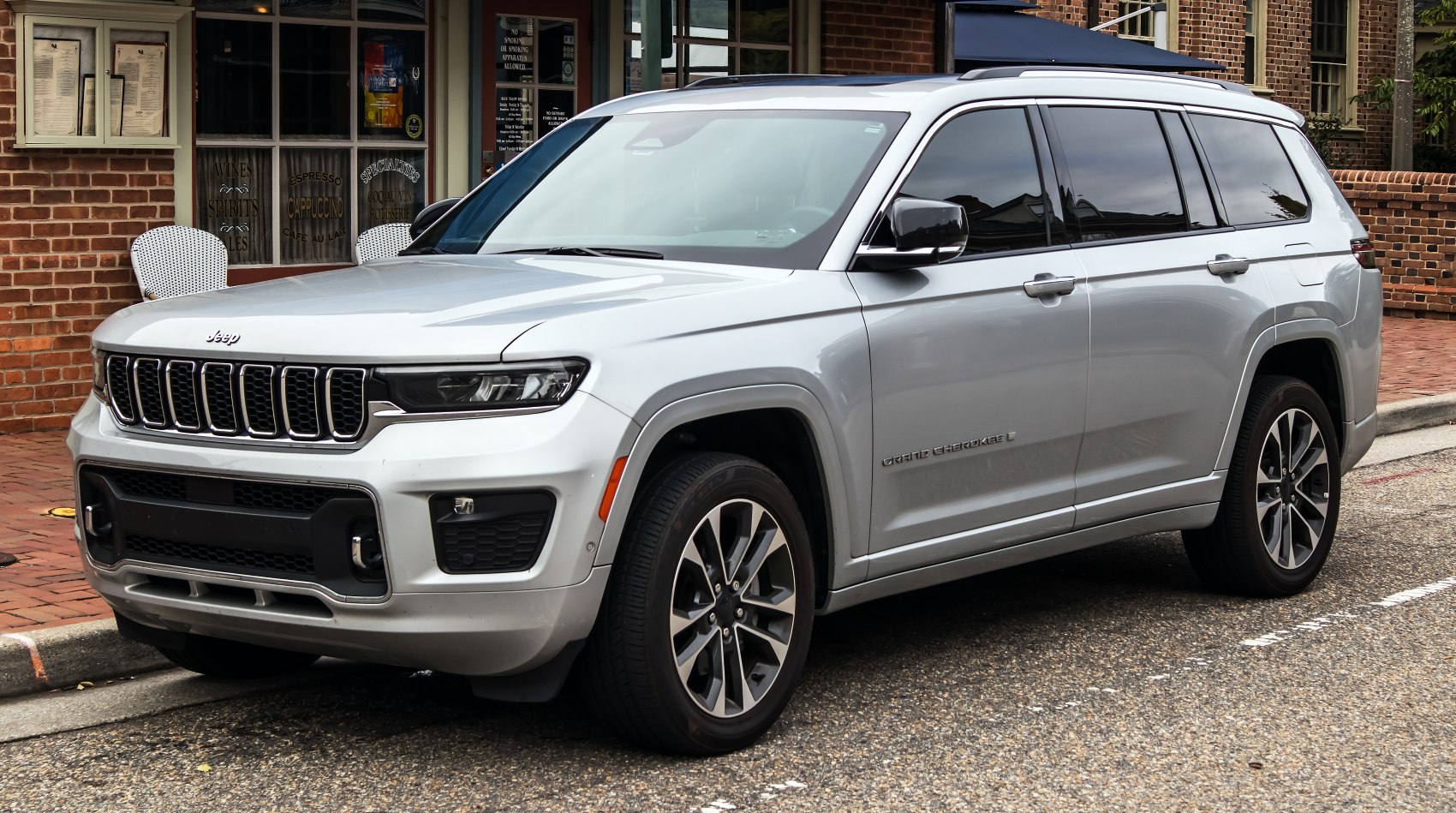 Silver SUV with modern front grille and headlights