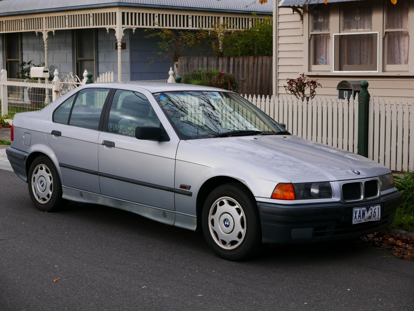 Classic sedan with rounded headlights and steel wheels
