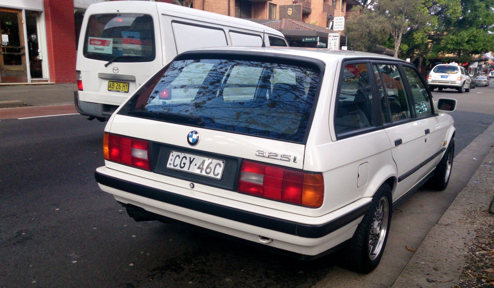 Rear view of classic E30 facelift station wagon with hatchback and distinctive tail lights