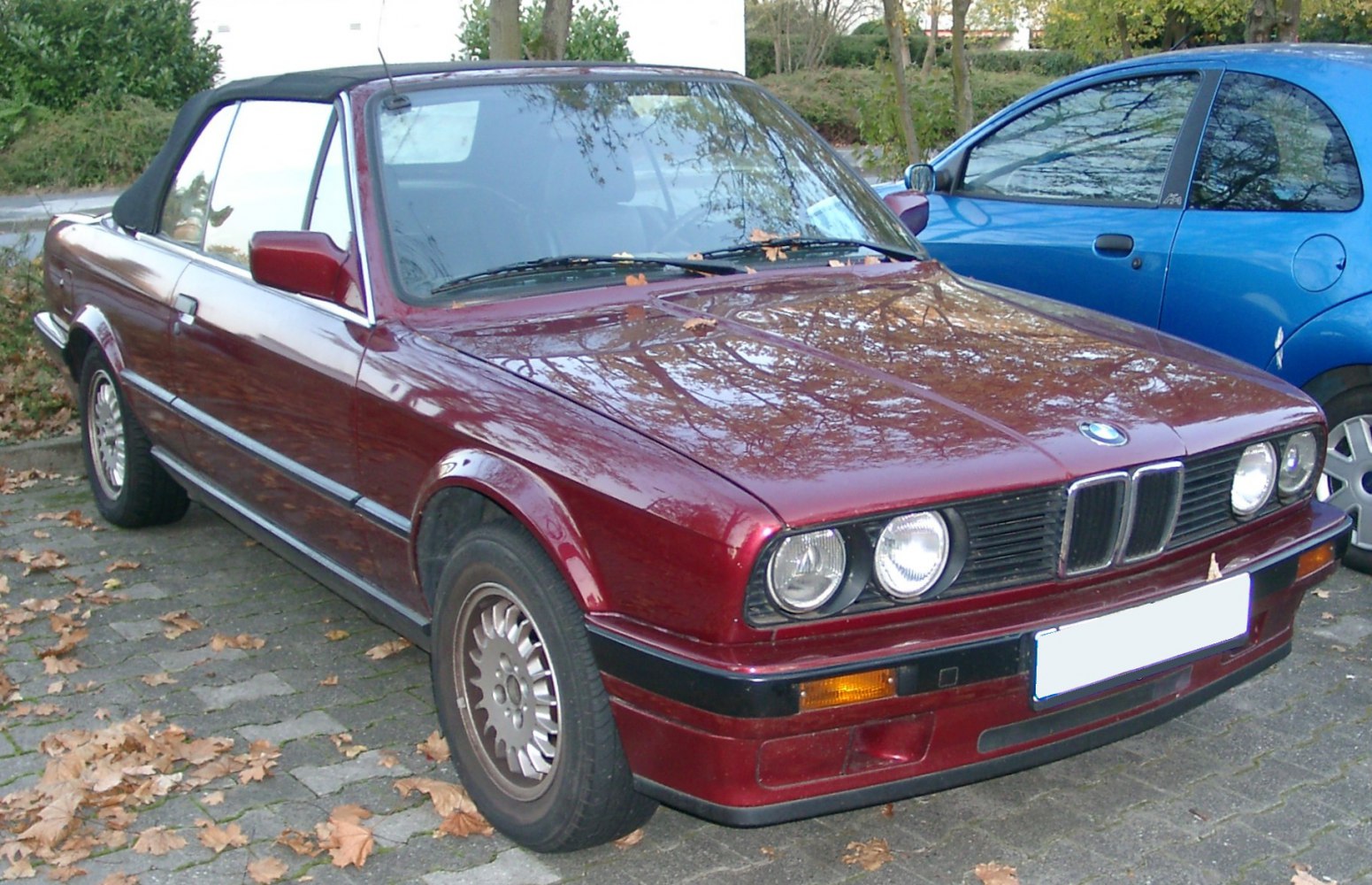 1980s two-door convertible with soft roof and classic styling