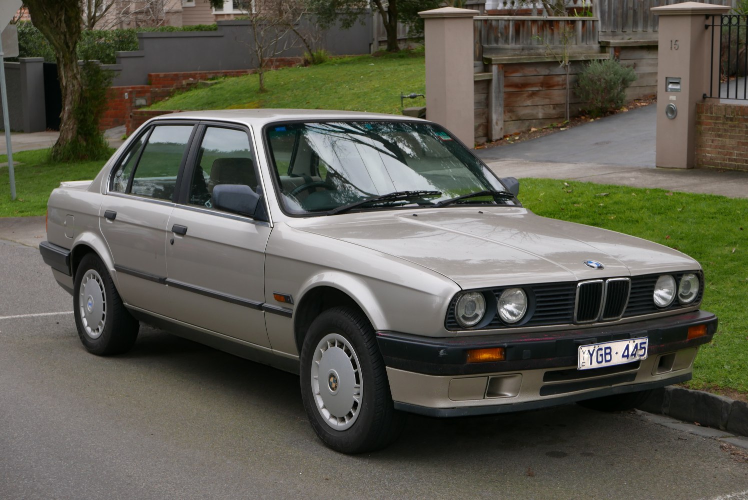 Classic sedan with quad round headlights and alloy wheels