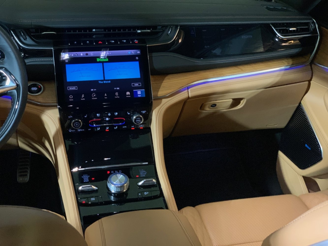 Touchscreen center console and rotary gear selector with premium wood trim