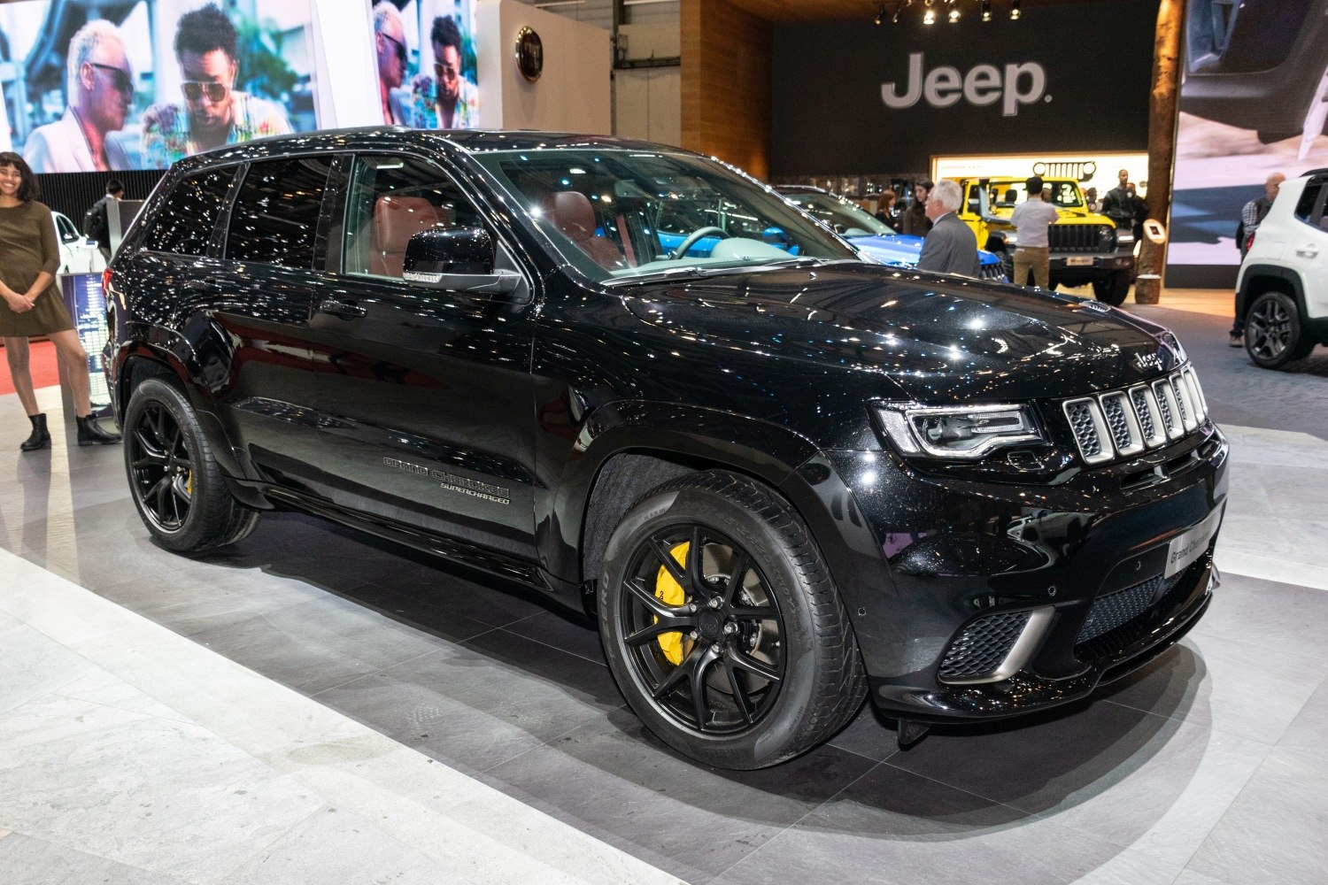 Black SUV with yellow brake calipers and sporty wheels