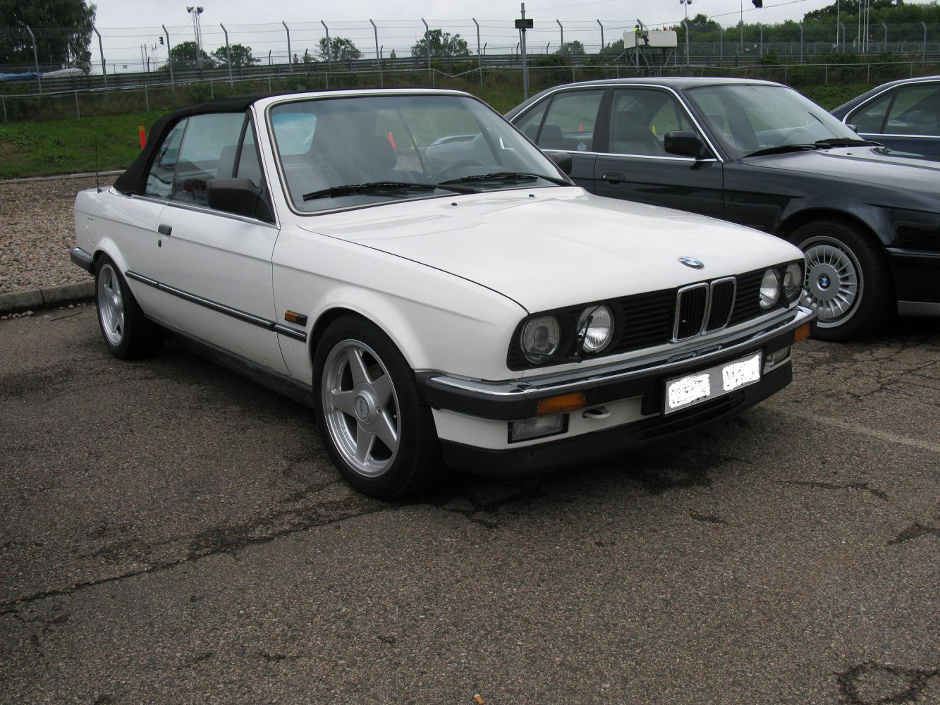 Classic 1985 convertible with soft top and alloy wheels