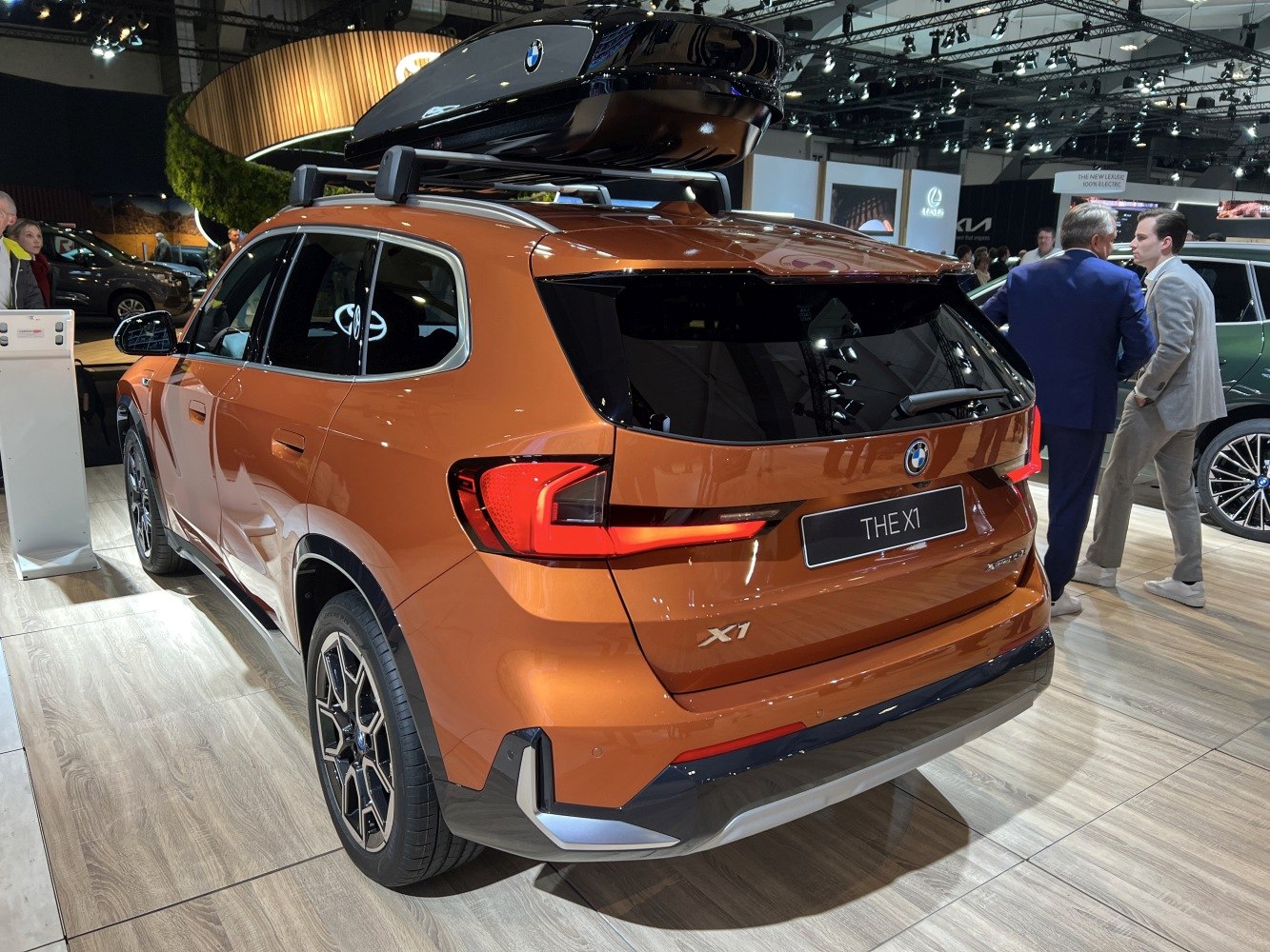 Rear view with sharp taillights and roof cargo box