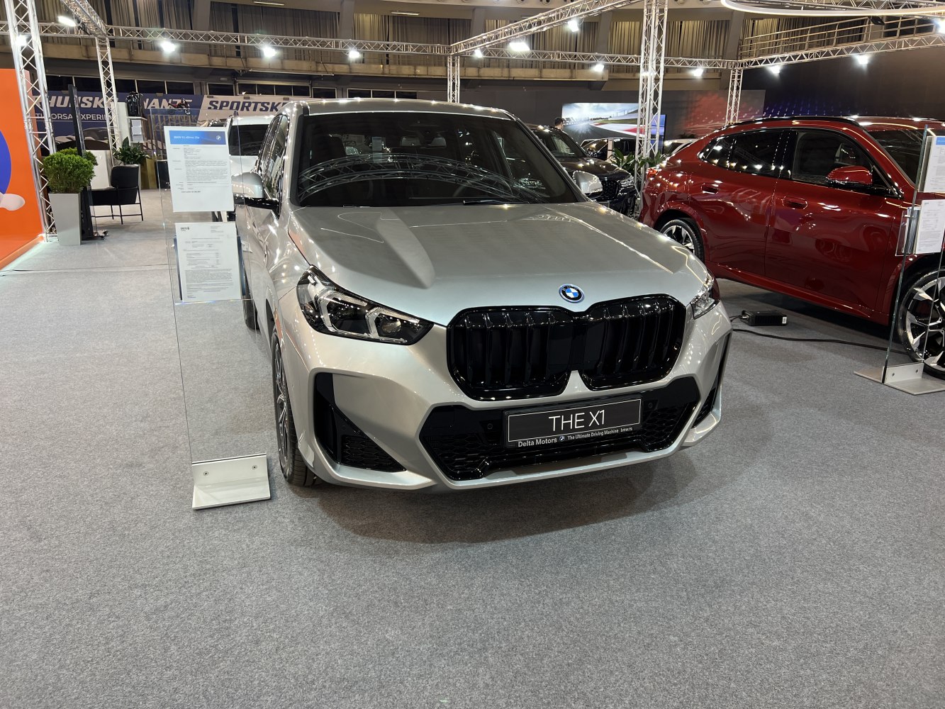 Front view with black kidney grille and sleek headlights
